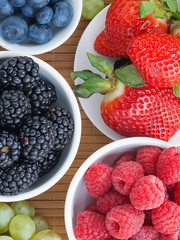 Close up of blackberries, grapes, blueberries, strawberries, and raspberries.