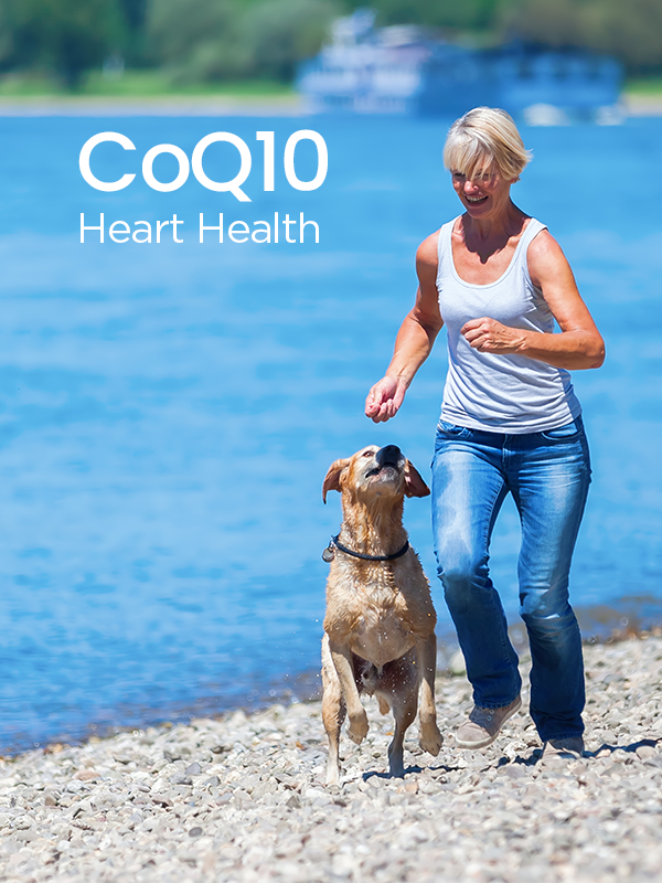 Woman running on beach with dog. Heart health and CoQ10 text.
