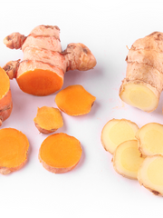 close up of turmeric root and ginger root.